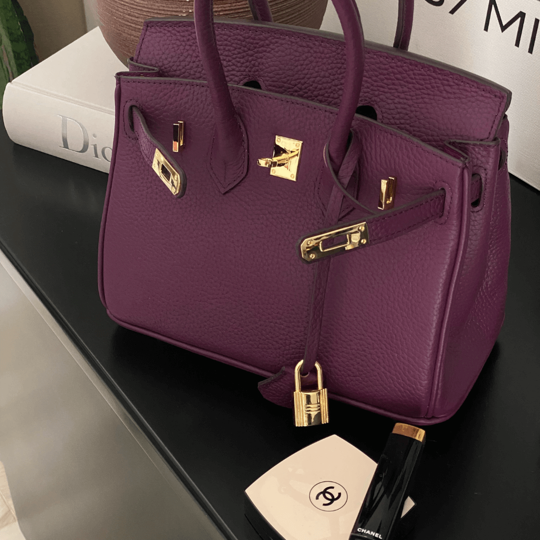 Iconic Vegan Leather Handbag – Timeless Design with Gold Accents